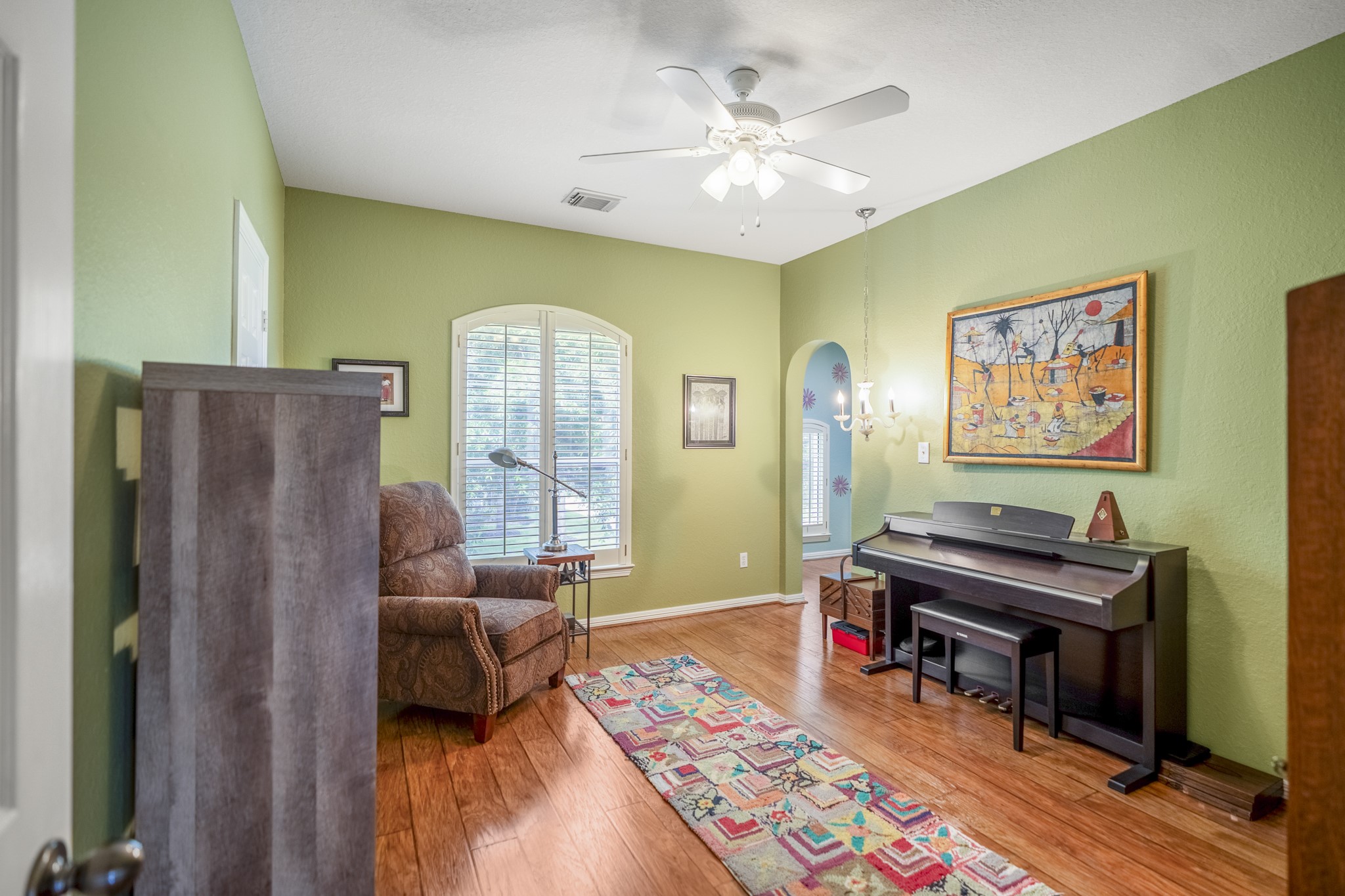 1438 Hatchmere Place Spring, TX 77379 - Photo 27 of 50 The second bedroom in the home offers solid flooring, a nice size window and good size closet with great views out of the large window that has a plantation shutter to defuse light.