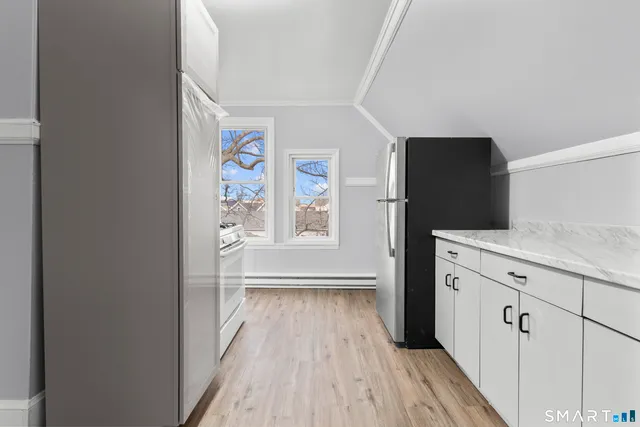 a view of a kitchen from a windows