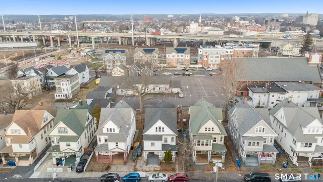 a view of residential houses with city view