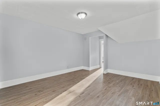 a view of cabinets with wooden floor