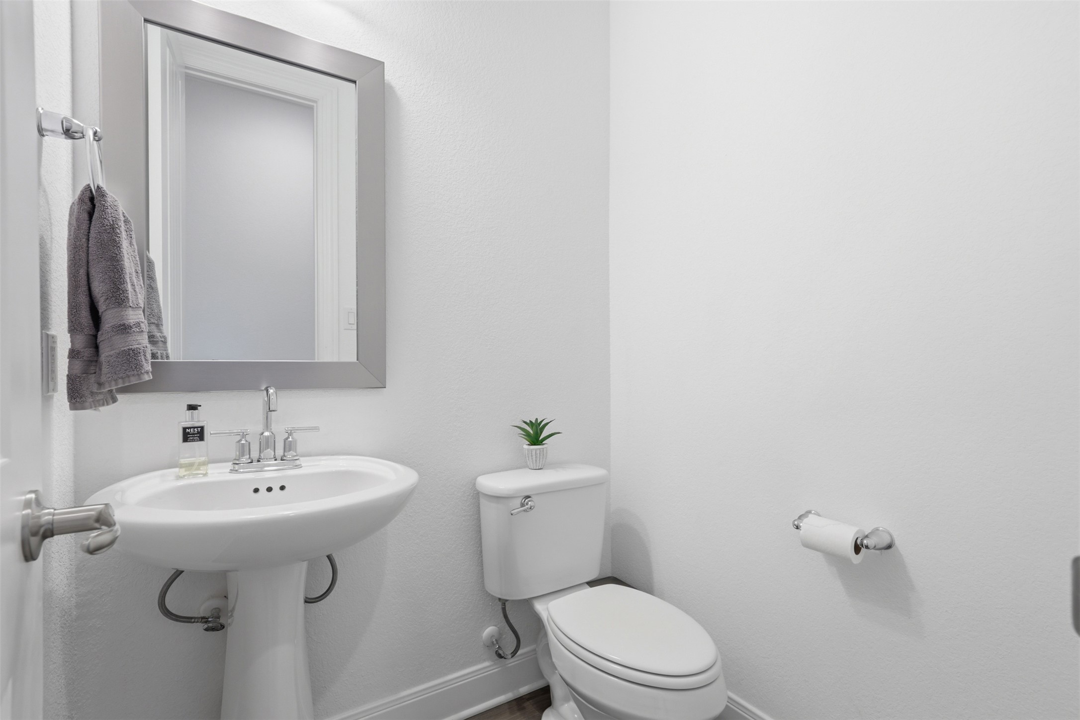 3021 Sage Ranch Drive Leander, TX 78641 - Photo 28 of 32 a bathroom with a sink toilet and mirror