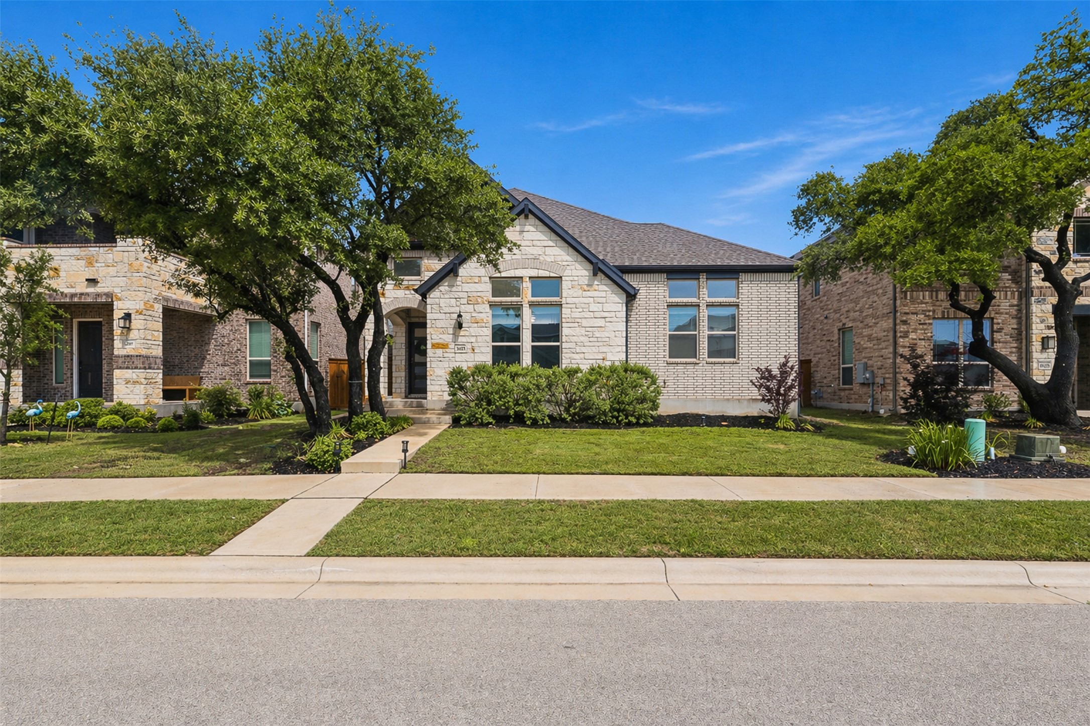 3021 Sage Ranch Drive Leander, TX 78641 - Photo 32 of 32 a front view of a house with a yard