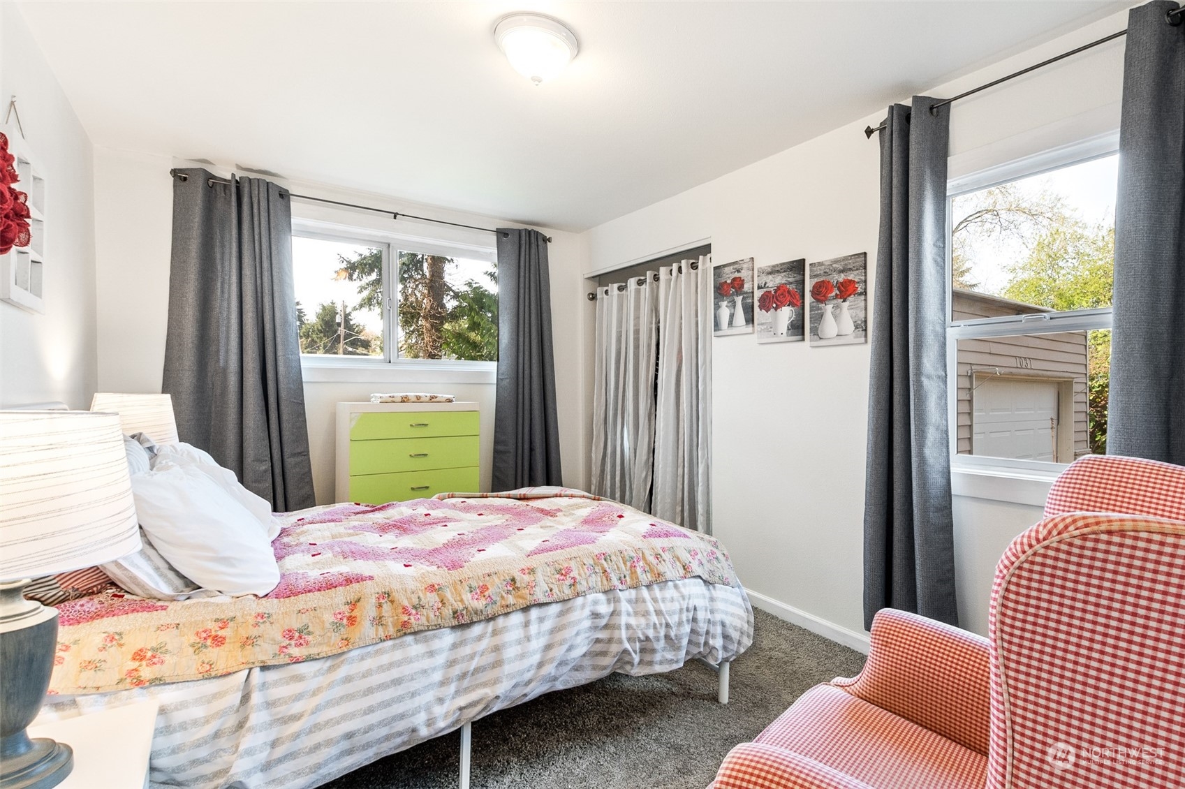 1031 Southwest 118th Street Seattle, WA 98146 - Photo 12 of 16 a bedroom with a bed and a window