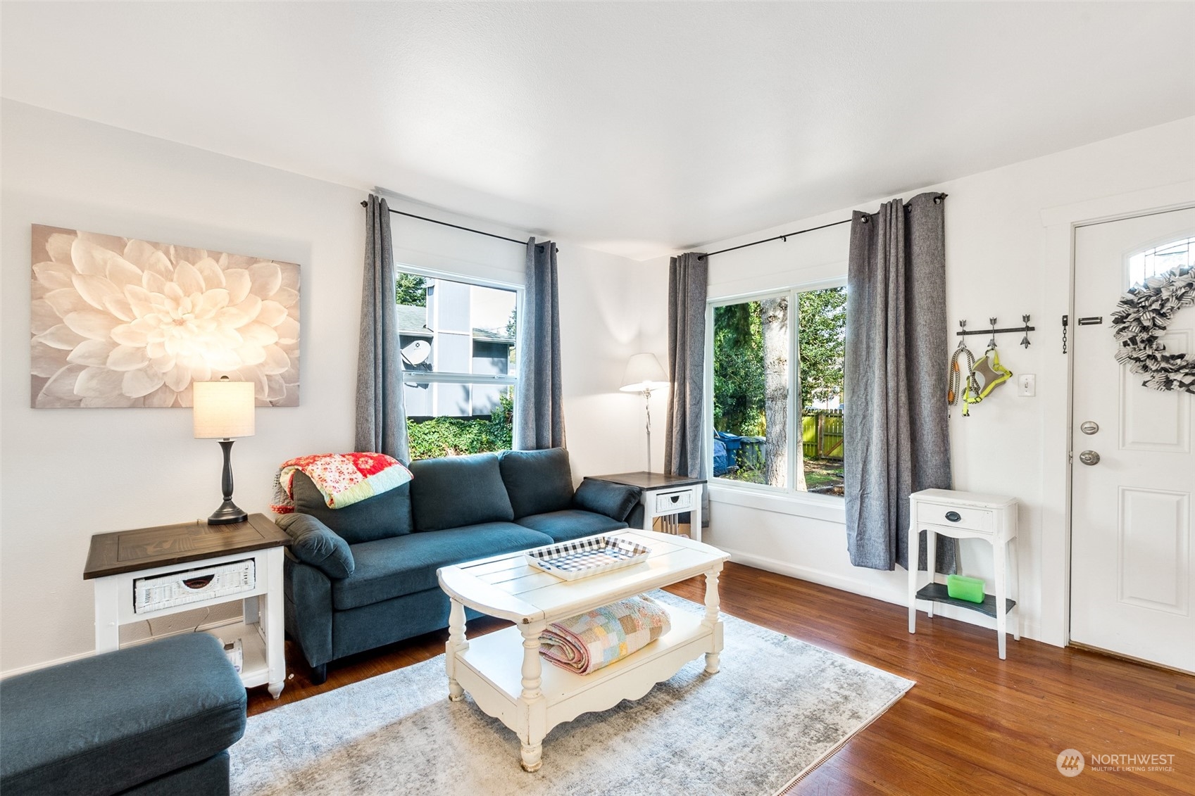 1031 Southwest 118th Street Seattle, WA 98146 - Photo 3 of 16 a living room with furniture and a large window