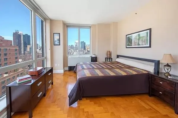 a kitchen with stainless steel appliances a stove a sink and a refrigerator