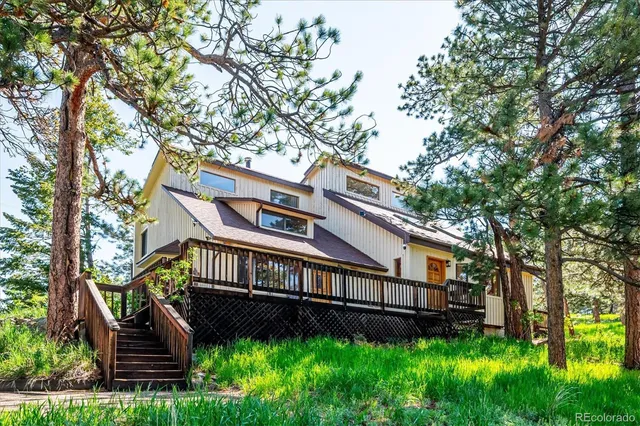 a backyard of a house with lots of green space