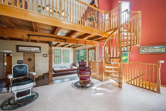 a view of a porch with furniture and a porch