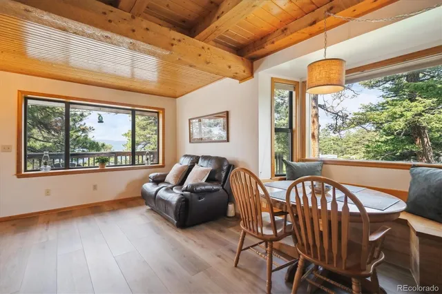a view of a porch with furniture and a window