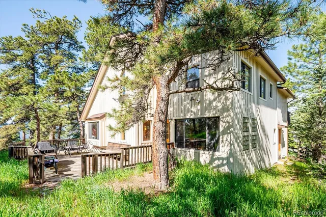 front view of a house with a garden