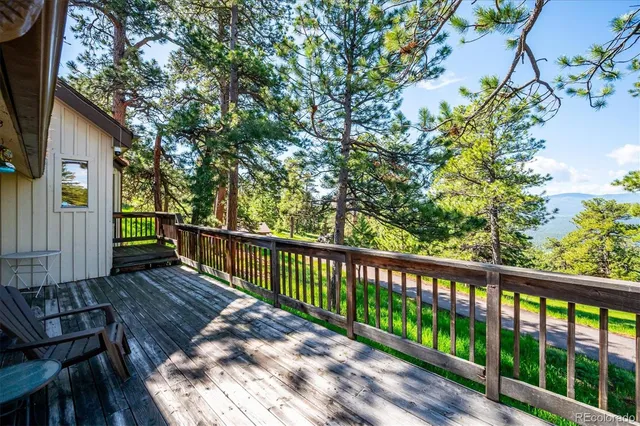 a view of a wooden fence