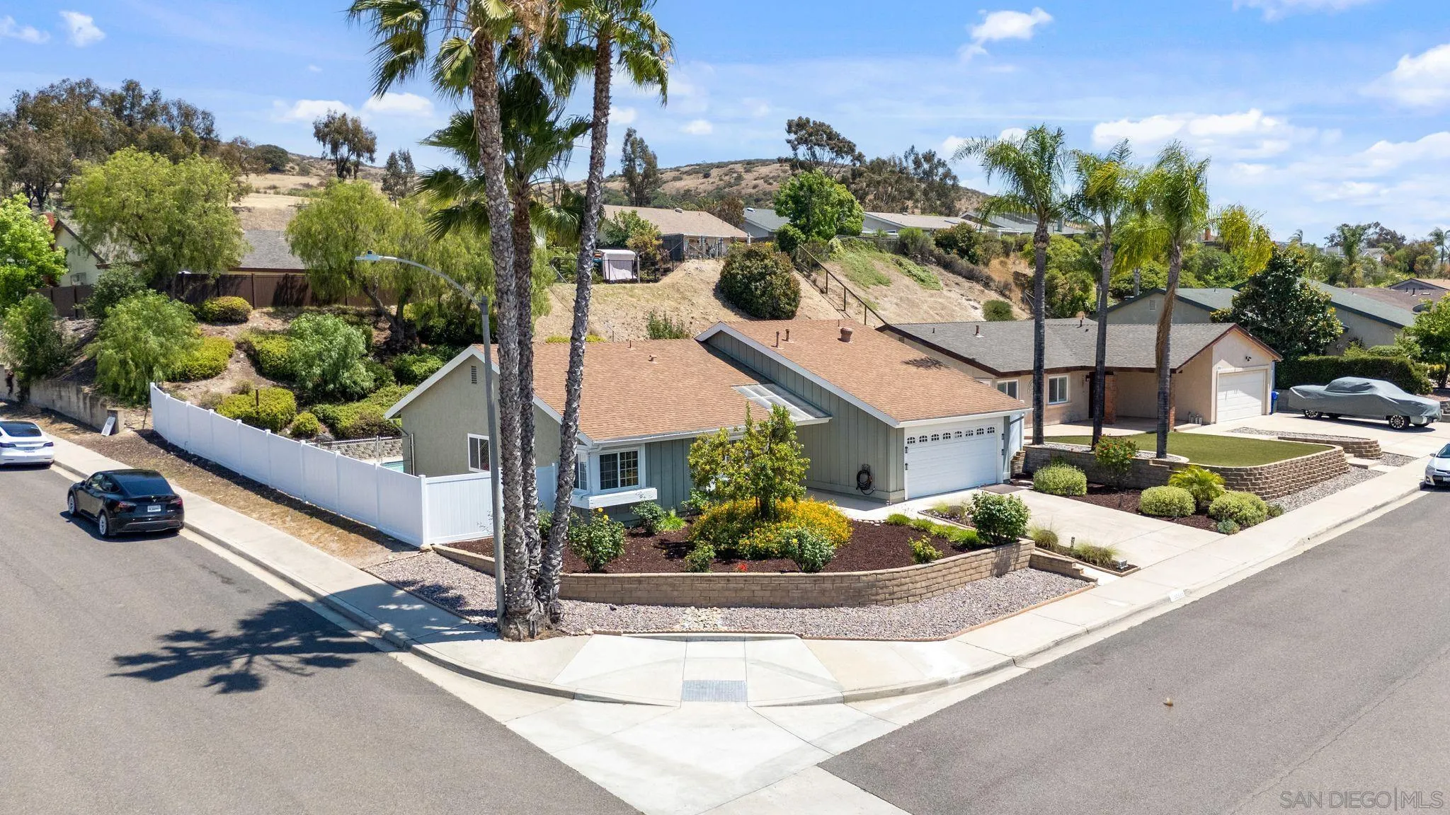 10565 Strathmore Drive Santee, CA 92071 - Photo 55 of 59 front view of a house with a street