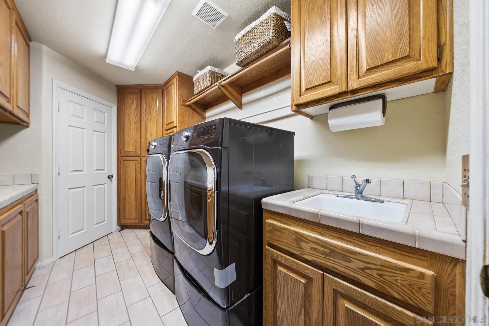 4641 Luneta View Julian, CA 92036 - Photo 35 of 56 a utility room with dryer and washer