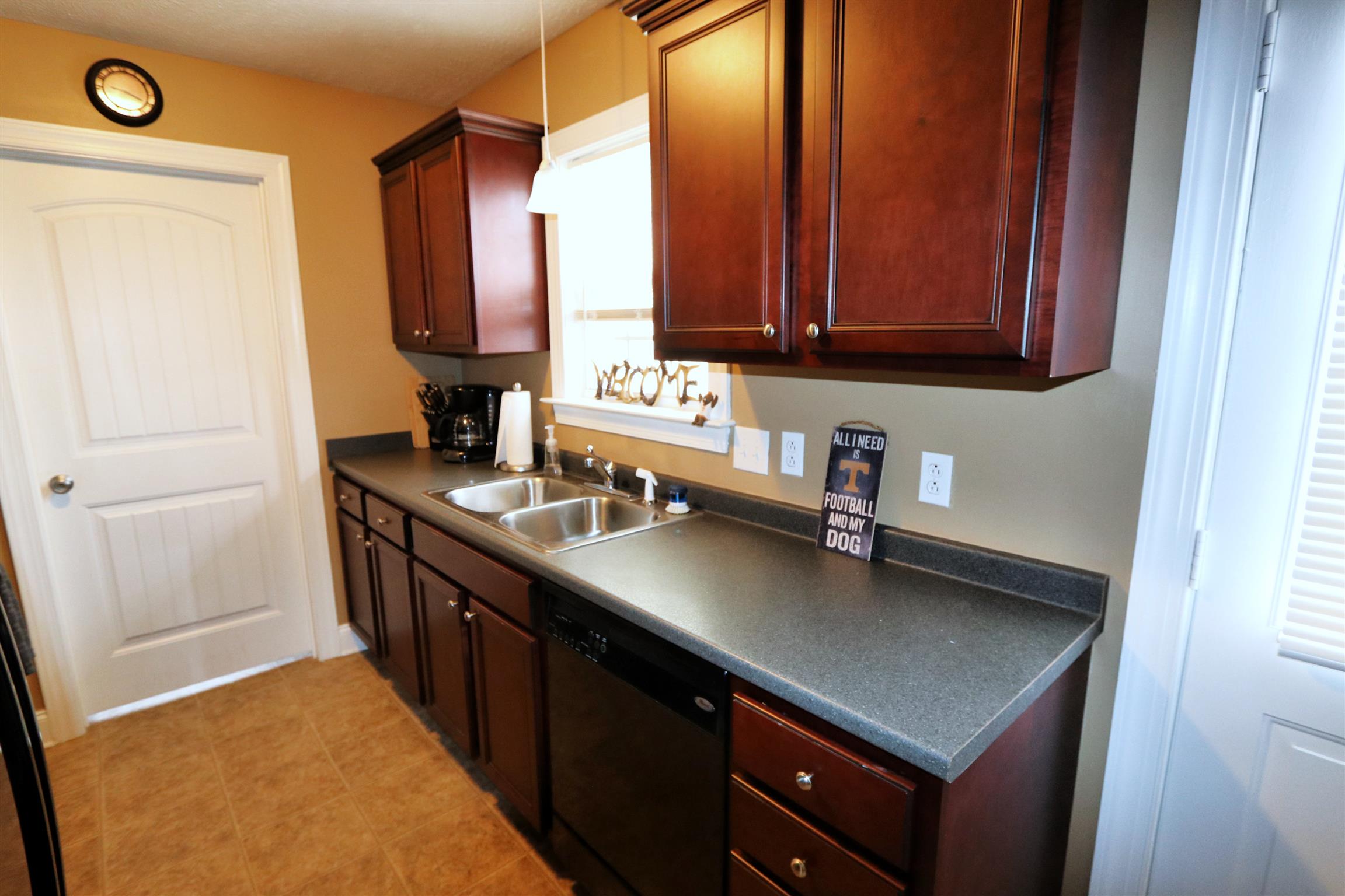 5650 Lakeview Road Springfield, TN 37172 - Photo 7 of 14 a kitchen with stainless steel appliances a sink dishwasher stove and cabinets