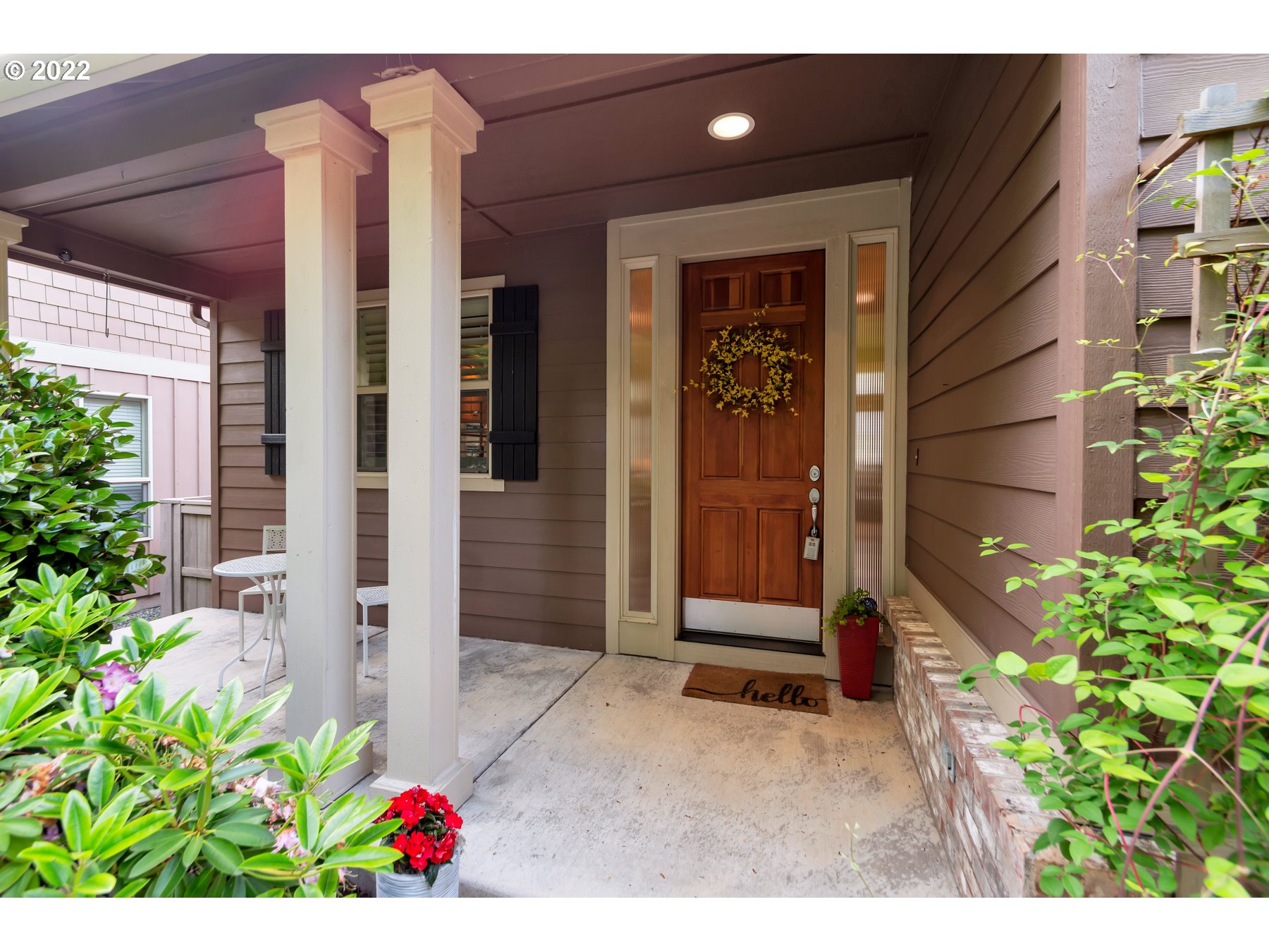 19704 Southeast 26th Way Camas, WA 98607 - Photo 5 of 32 a couple of potted plants in front of door