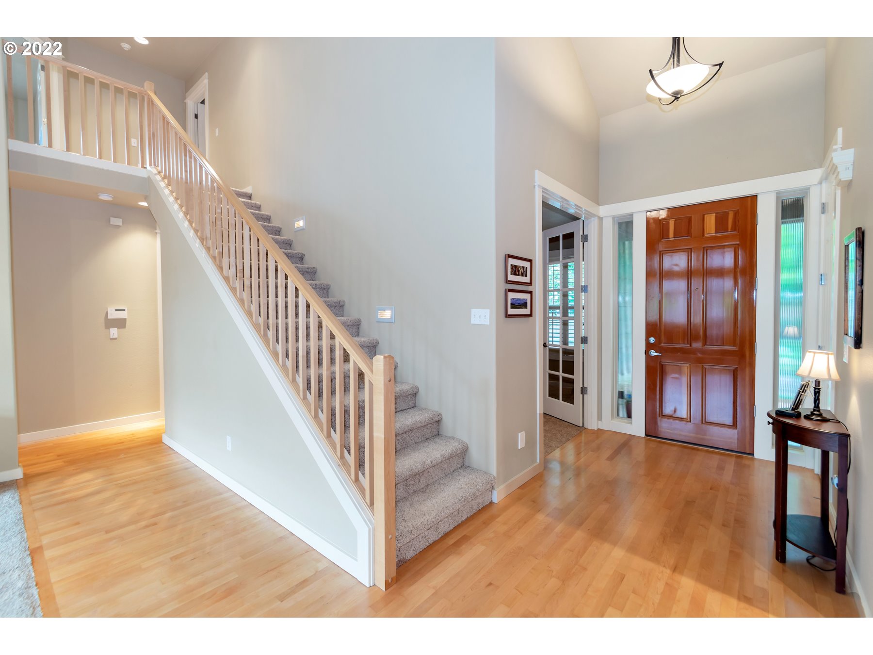 19704 Southeast 26th Way Camas, WA 98607 - Photo 6 of 32 a view of an entryway with wooden floor