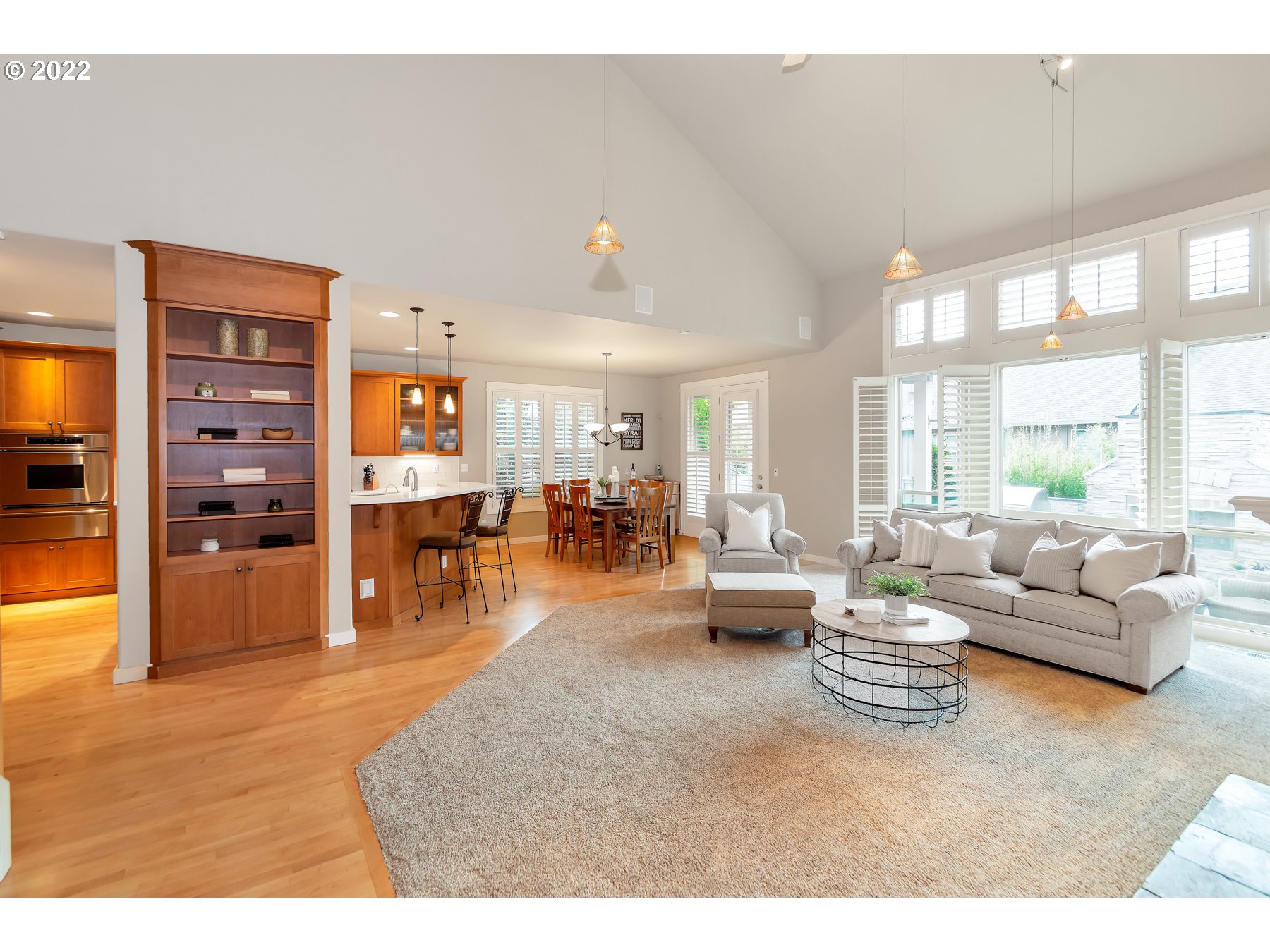 19704 Southeast 26th Way Camas, WA 98607 - Photo 8 of 32 a living room with furniture and a large window
