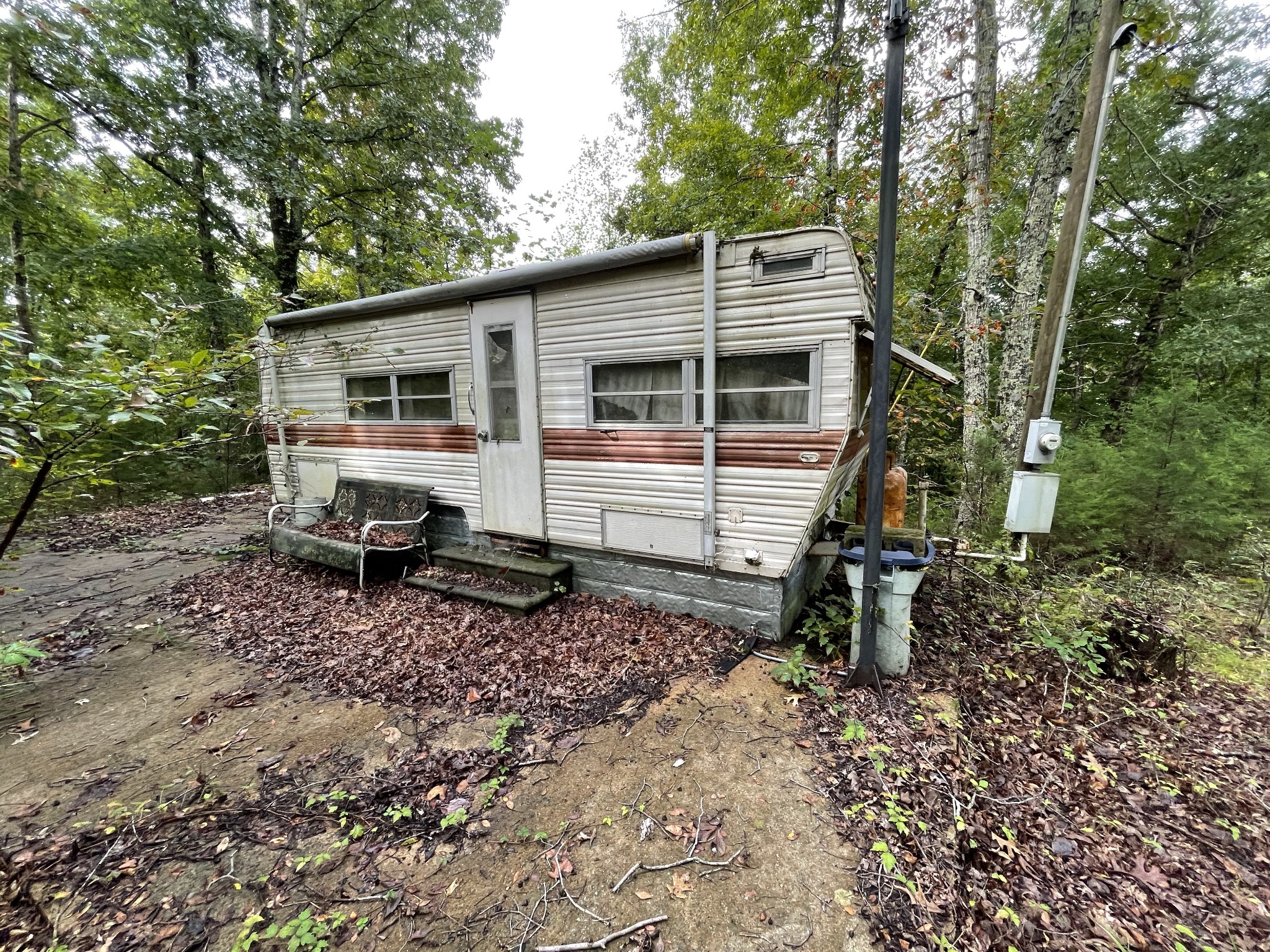 0 School House Road Primm Springs, TN 38476 - Photo 4 of 18 a view of a house with a yard and furniture