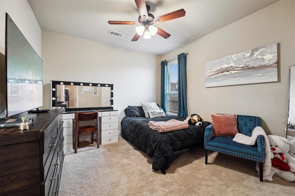 112 Shepherds Hill Road Waxahachie, TX 75165 - Photo 23 of 38 a living room with furniture and a flat screen tv