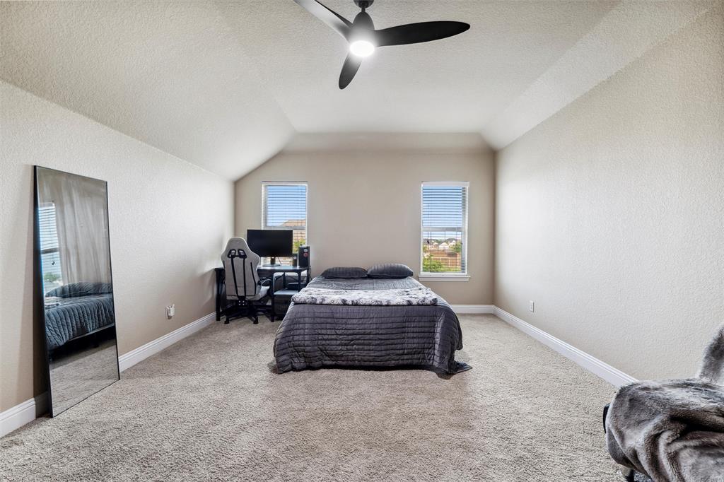 112 Shepherds Hill Road Waxahachie, TX 75165 - Photo 26 of 38 a bedroom with bed and window