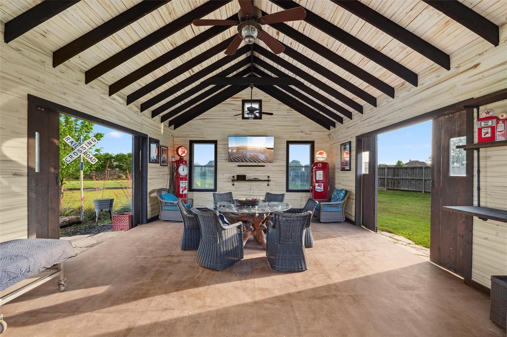 112 Shepherds Hill Road Waxahachie, TX 75165 - Photo 28 of 38 a view of a patio with a table chairs and a backyard
