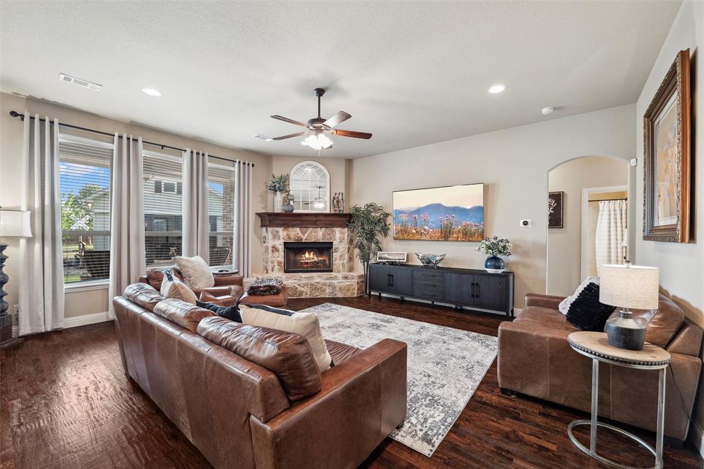 112 Shepherds Hill Road Waxahachie, TX 75165 - Photo 5 of 38 a living room with furniture fireplace and a large window