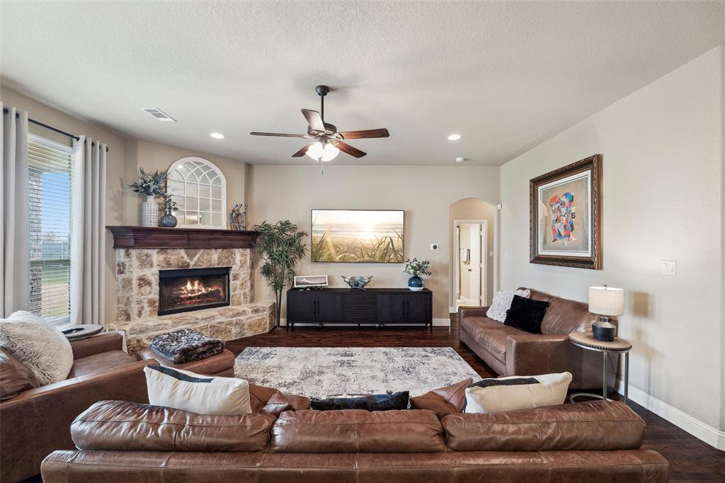 112 Shepherds Hill Road Waxahachie, TX 75165 - Photo 6 of 38 a living room with furniture and a fireplace