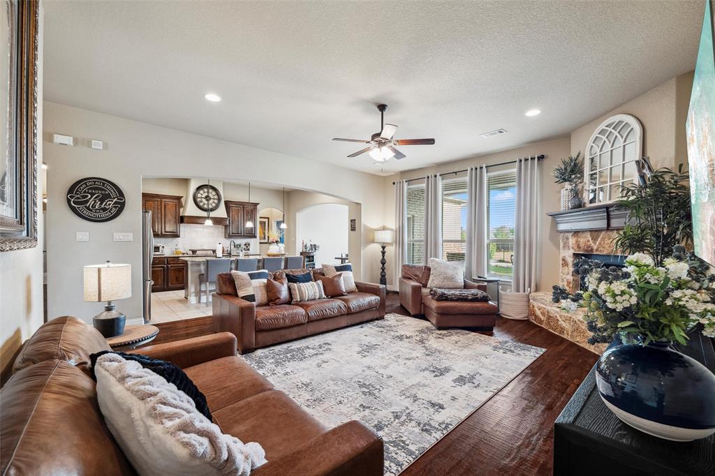 112 Shepherds Hill Road Waxahachie, TX 75165 - Photo 7 of 38 a living room with furniture and a chandelier