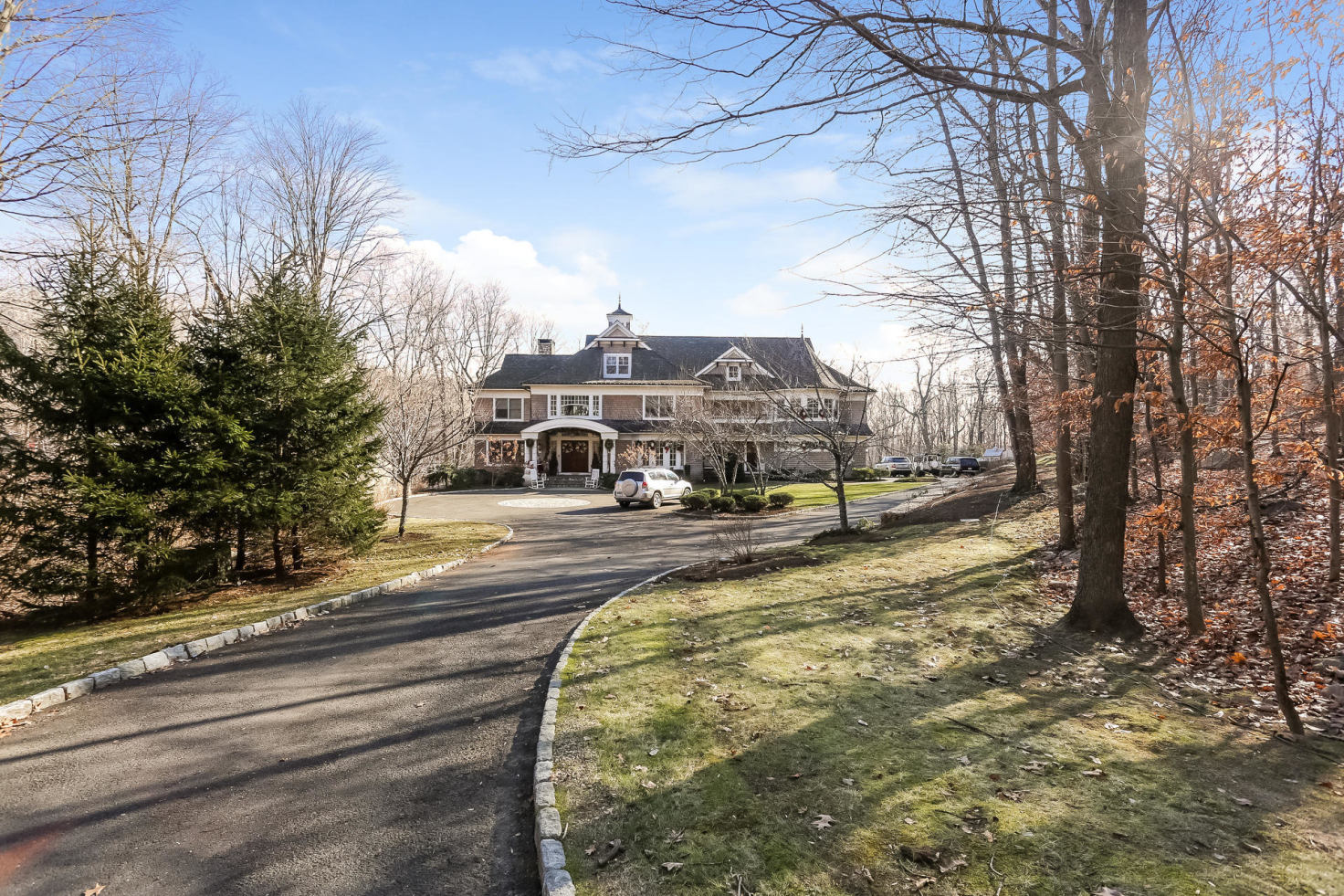 131 Thayer Pond Road New Canaan, CT 06840 - Photo 1 of 21 a view of a yard with large trees