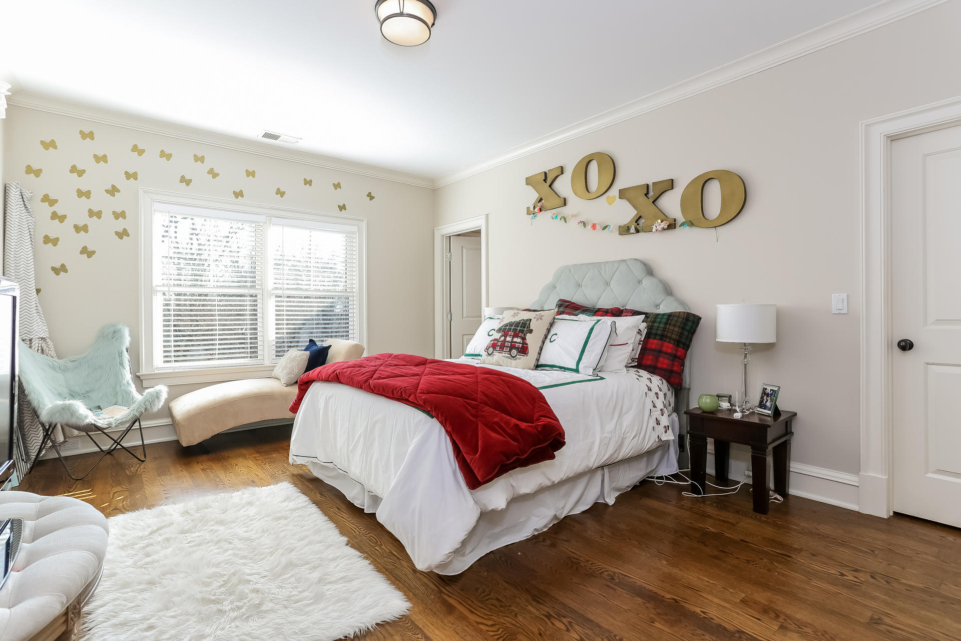 131 Thayer Pond Road New Canaan, CT 06840 - Photo 11 of 21 a bedroom with a bed and wooden floor