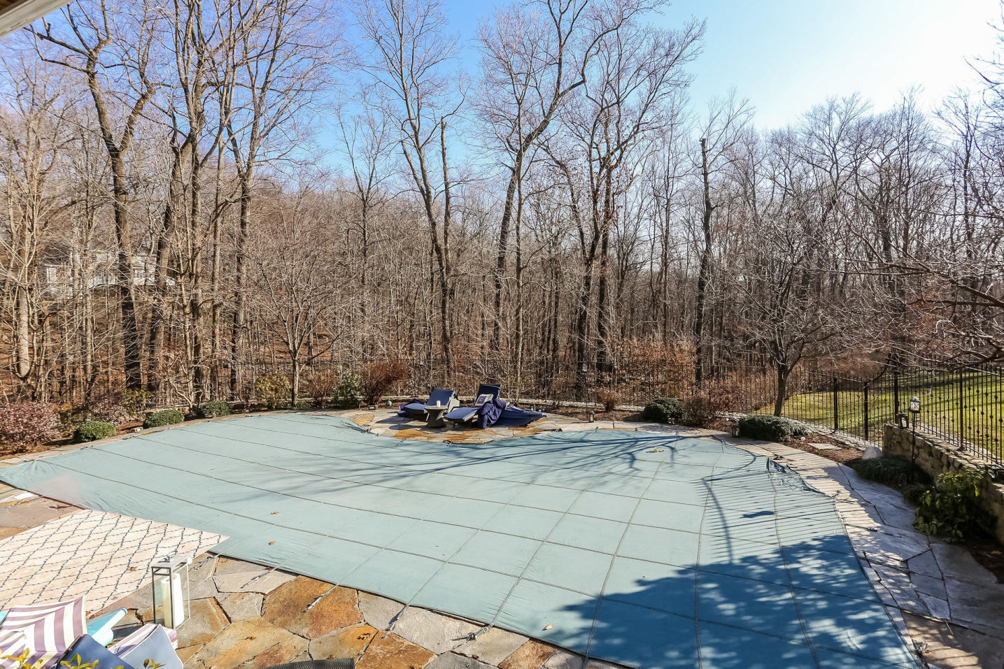 131 Thayer Pond Road New Canaan, CT 06840 - Photo 14 of 21 a view of a backyard with plants and trees