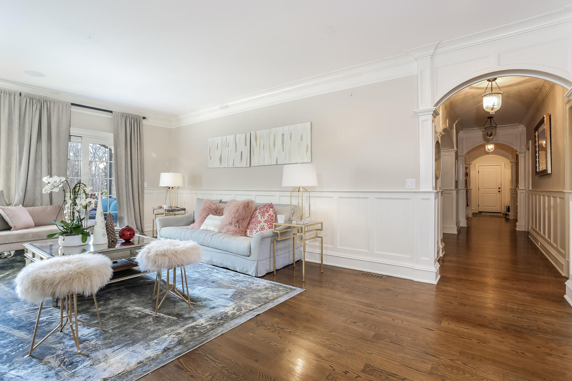 131 Thayer Pond Road New Canaan, CT 06840 - Photo 2 of 21 a living room with furniture and wooden floor