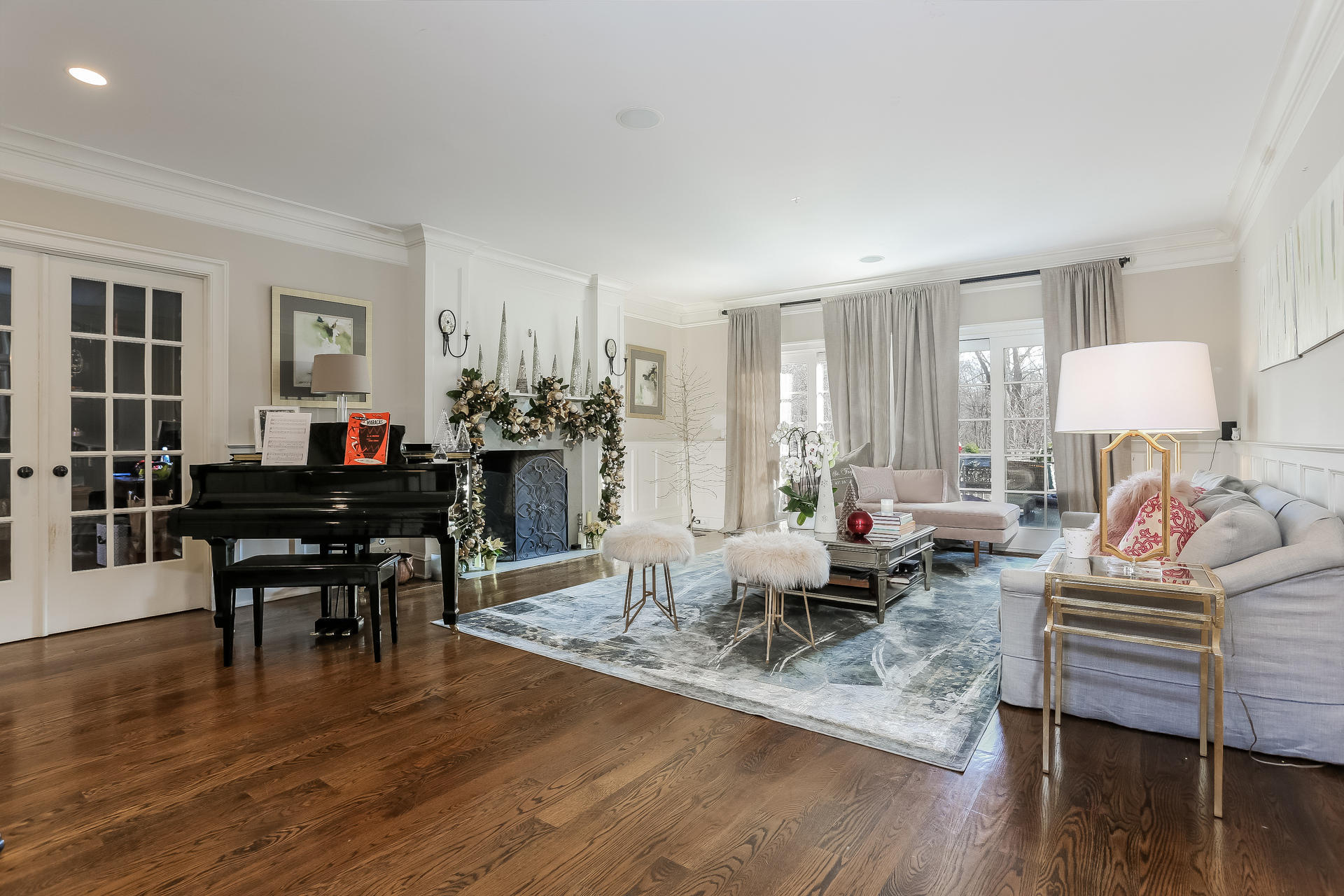 131 Thayer Pond Road New Canaan, CT 06840 - Photo 3 of 21 a living room with furniture and wooden floor