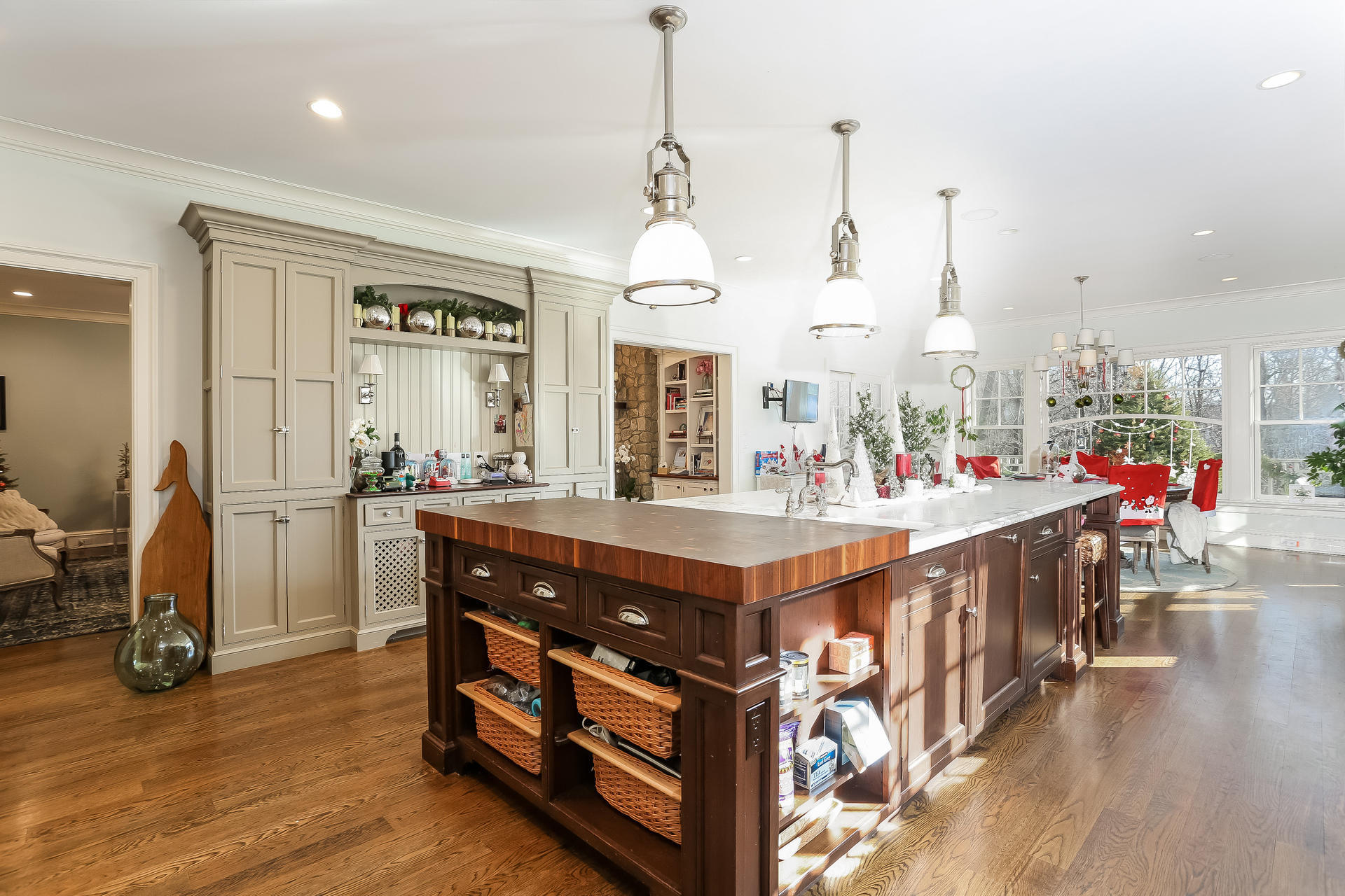 131 Thayer Pond Road New Canaan, CT 06840 - Photo 5 of 21 a very nice looking room with kitchen island hardwood floor and a view of living room