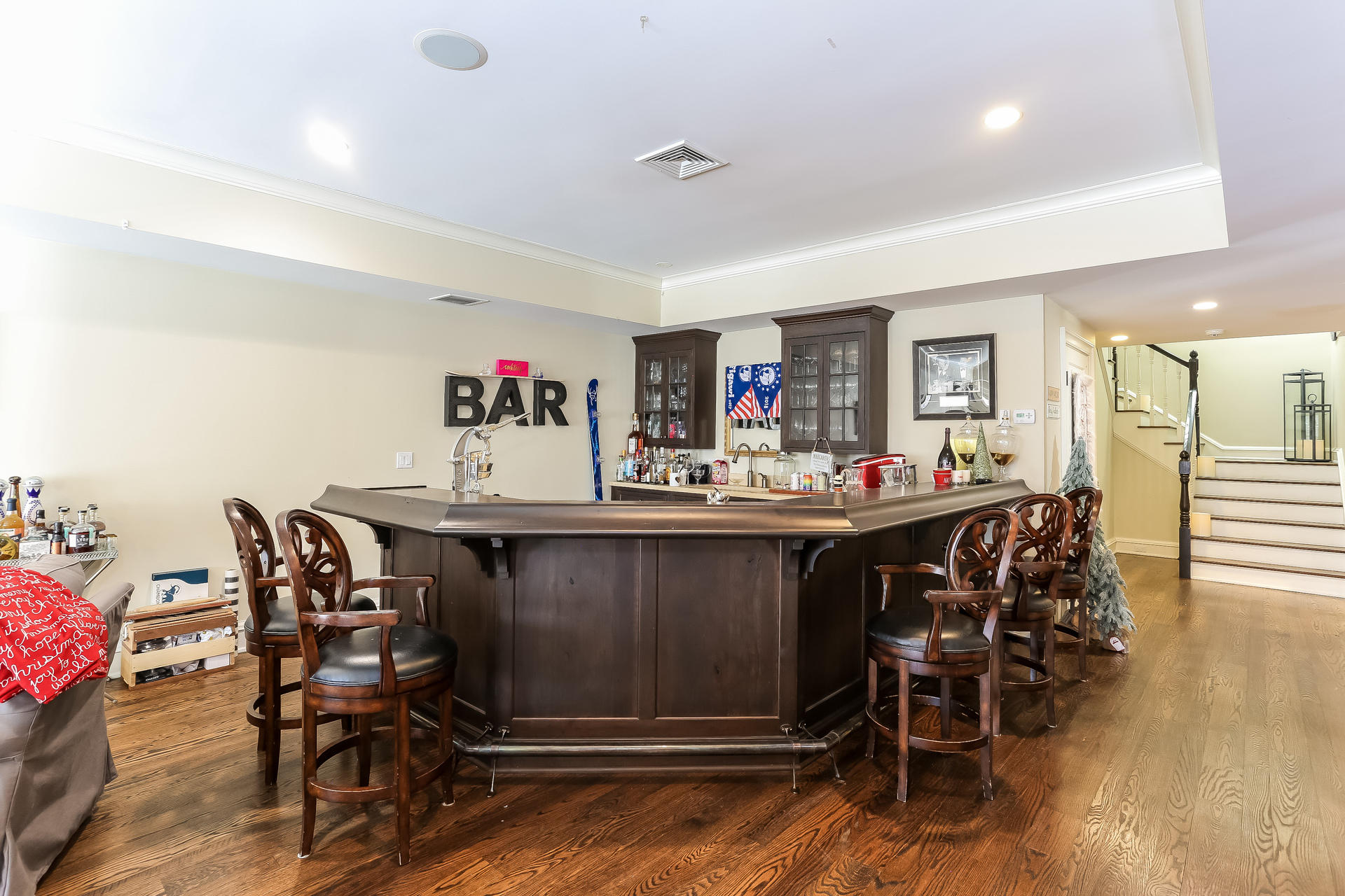 131 Thayer Pond Road New Canaan, CT 06840 - Photo 6 of 21 a living room with furniture and wooden floor