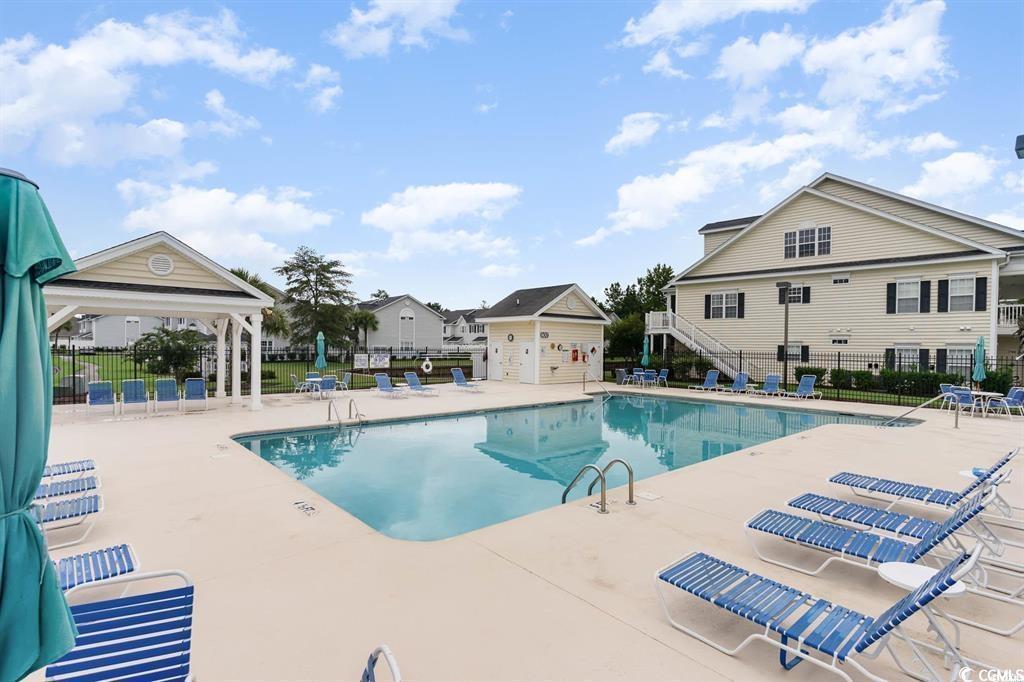 609 Sailbrooke Court, Unit 105 Murrells Inlet, SC 29576 - Photo 22 of 23 Community pool with a patio and stairway