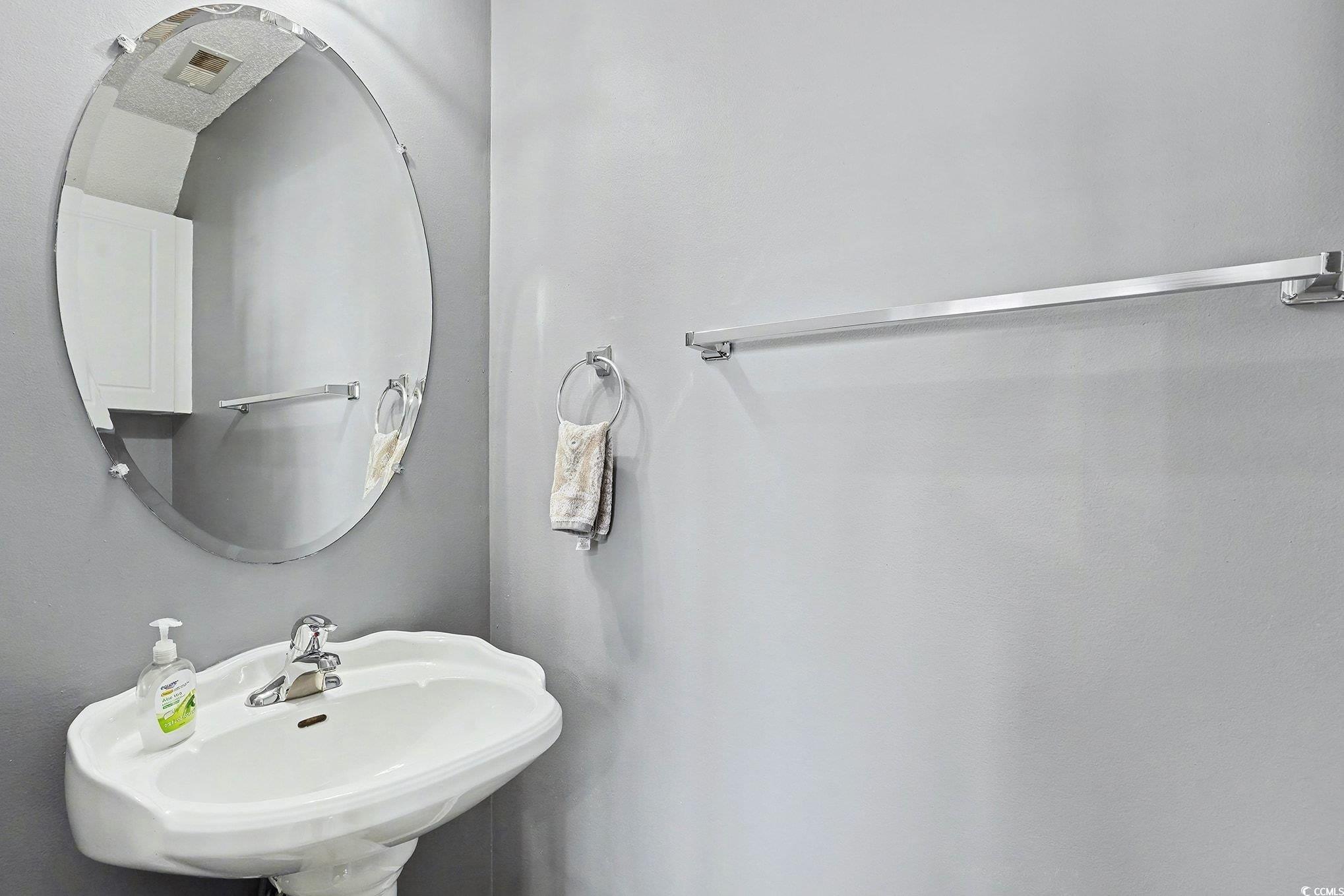 609 Sailbrooke Court, Unit 105 Murrells Inlet, SC 29576 - Photo 9 of 23 Bathroom with a sink