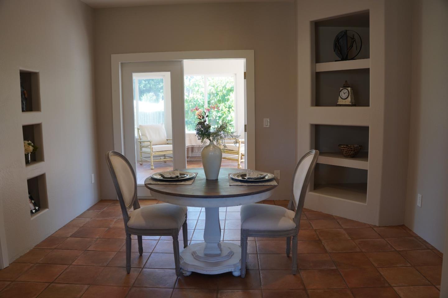 389 Corralitos Road Watsonville, CA 95076 - Photo 8 of 18 a view of a dining room with furniture and window