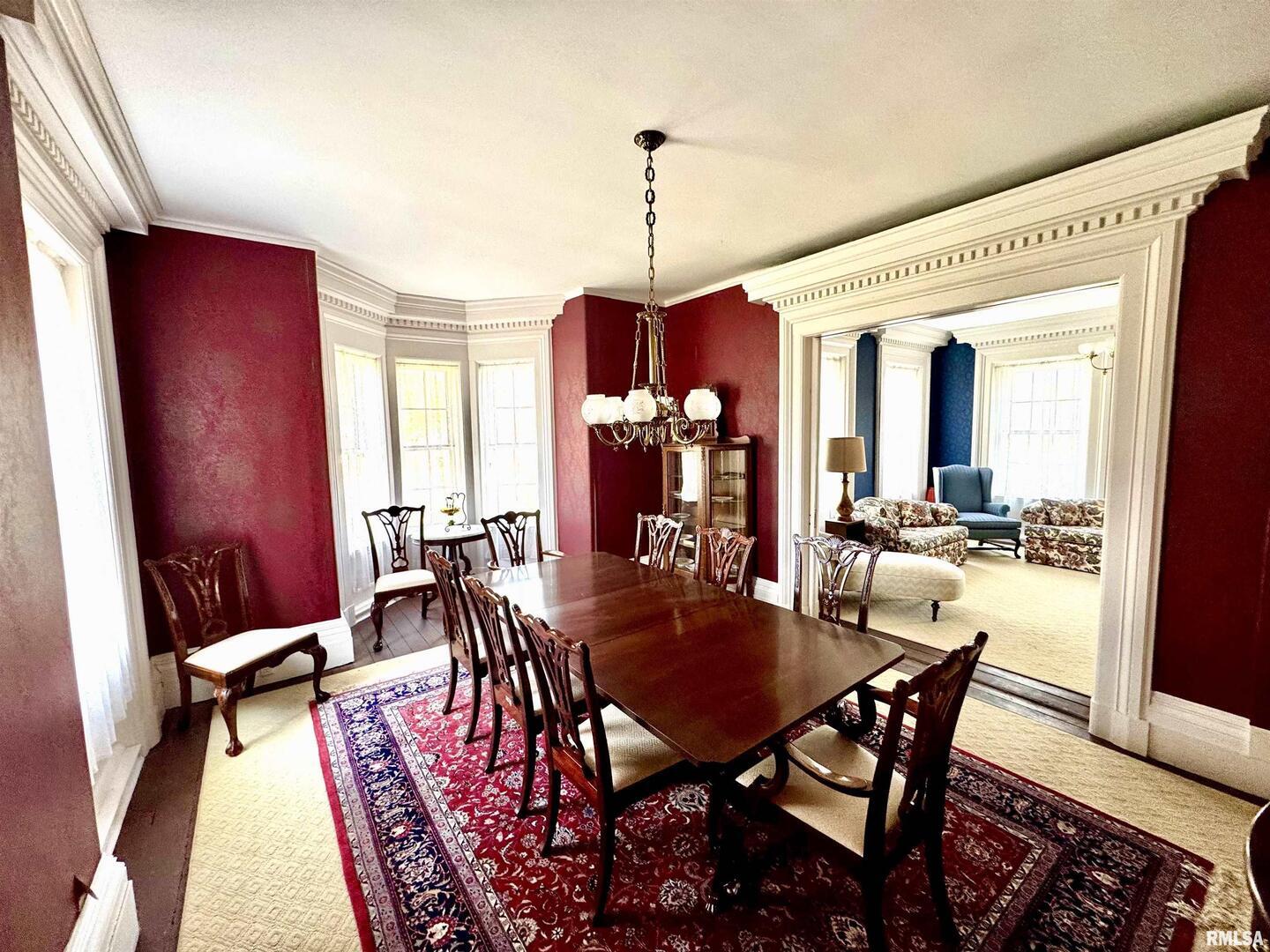 110 East Jefferson Street New Boston, IL 61272 - Photo 11 of 23 a dining room with furniture window and wooden floor