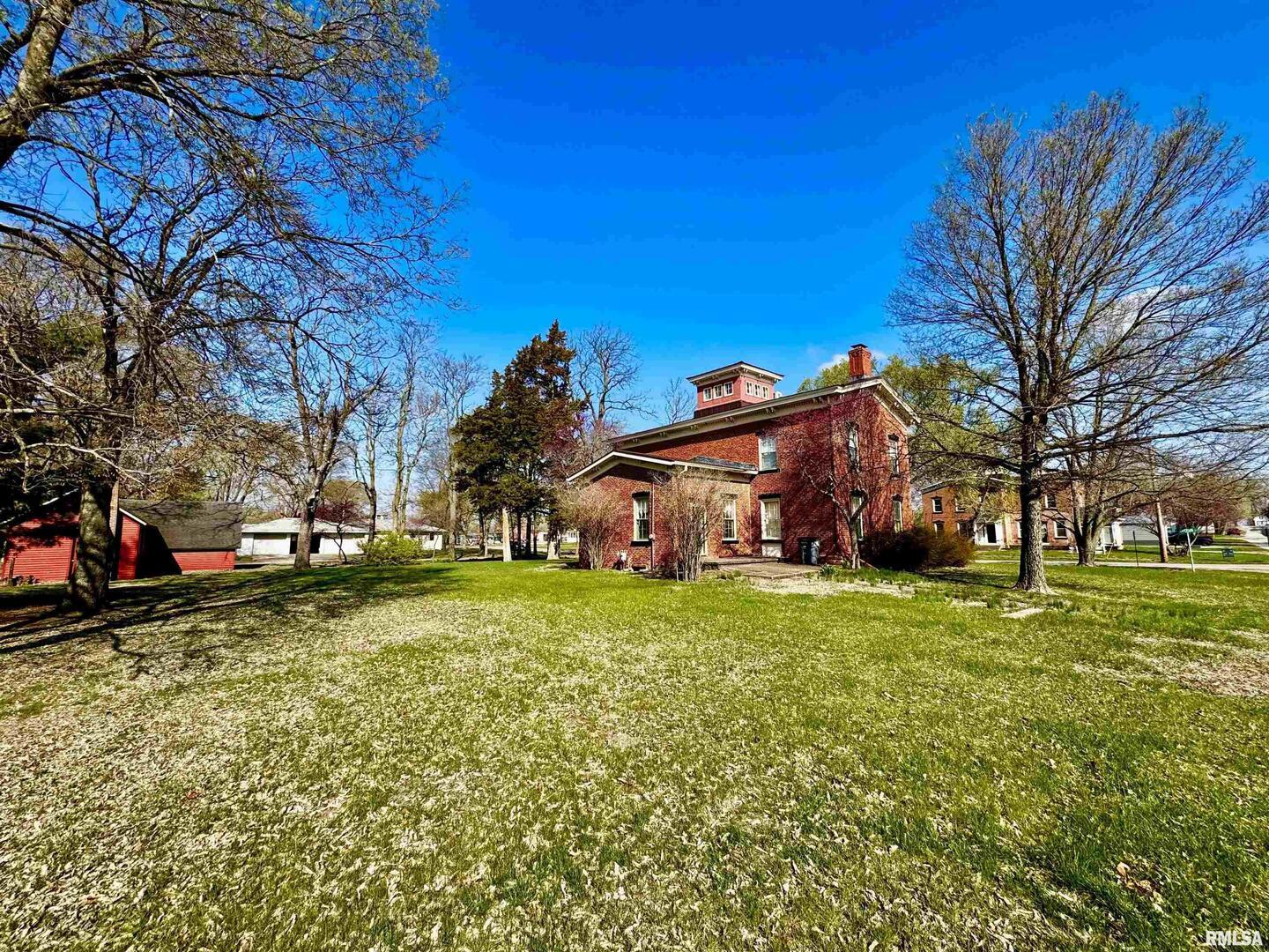 110 East Jefferson Street New Boston, IL 61272 - Photo 3 of 23 a view of a big yard with a house