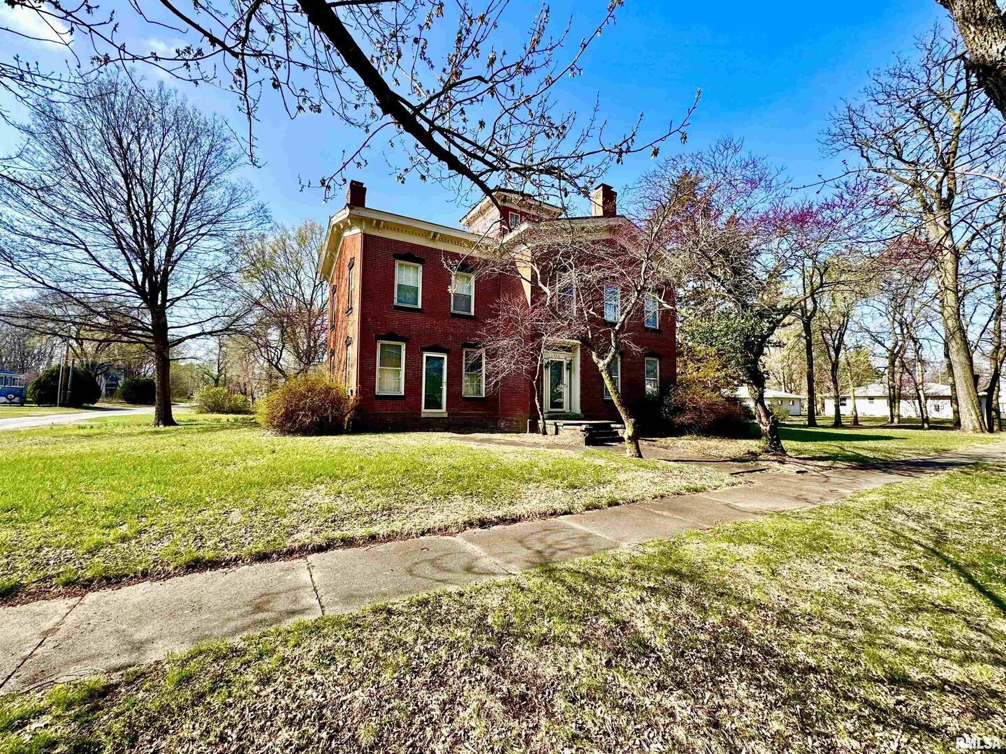 110 East Jefferson Street New Boston, IL 61272 - Photo 7 of 23 a view of a house with a yard