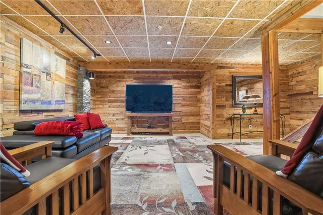 a view of a chairs and table in the balcony