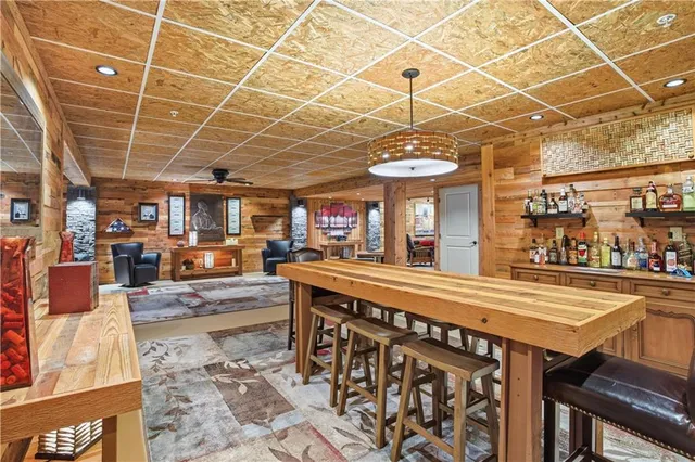 a view of a patio with a table and chairs