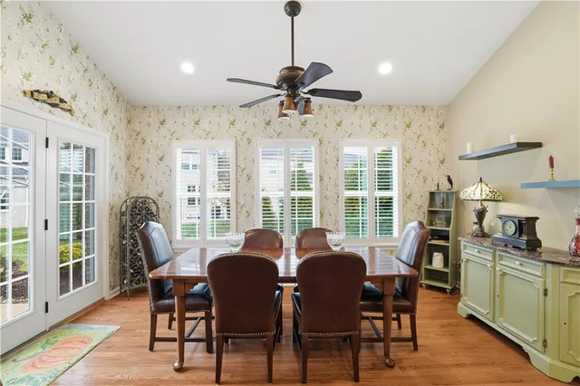 a view of a dining room with furniture window and outside view