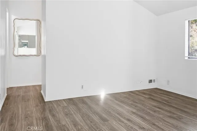 an aerial view of a house with garden space and sitting space