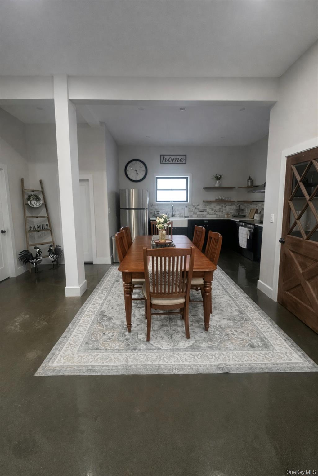 161 Hazel Road Livingston Manor, NY 12758 - Photo 2 of 24 Dining room with finished concrete floors and baseboards