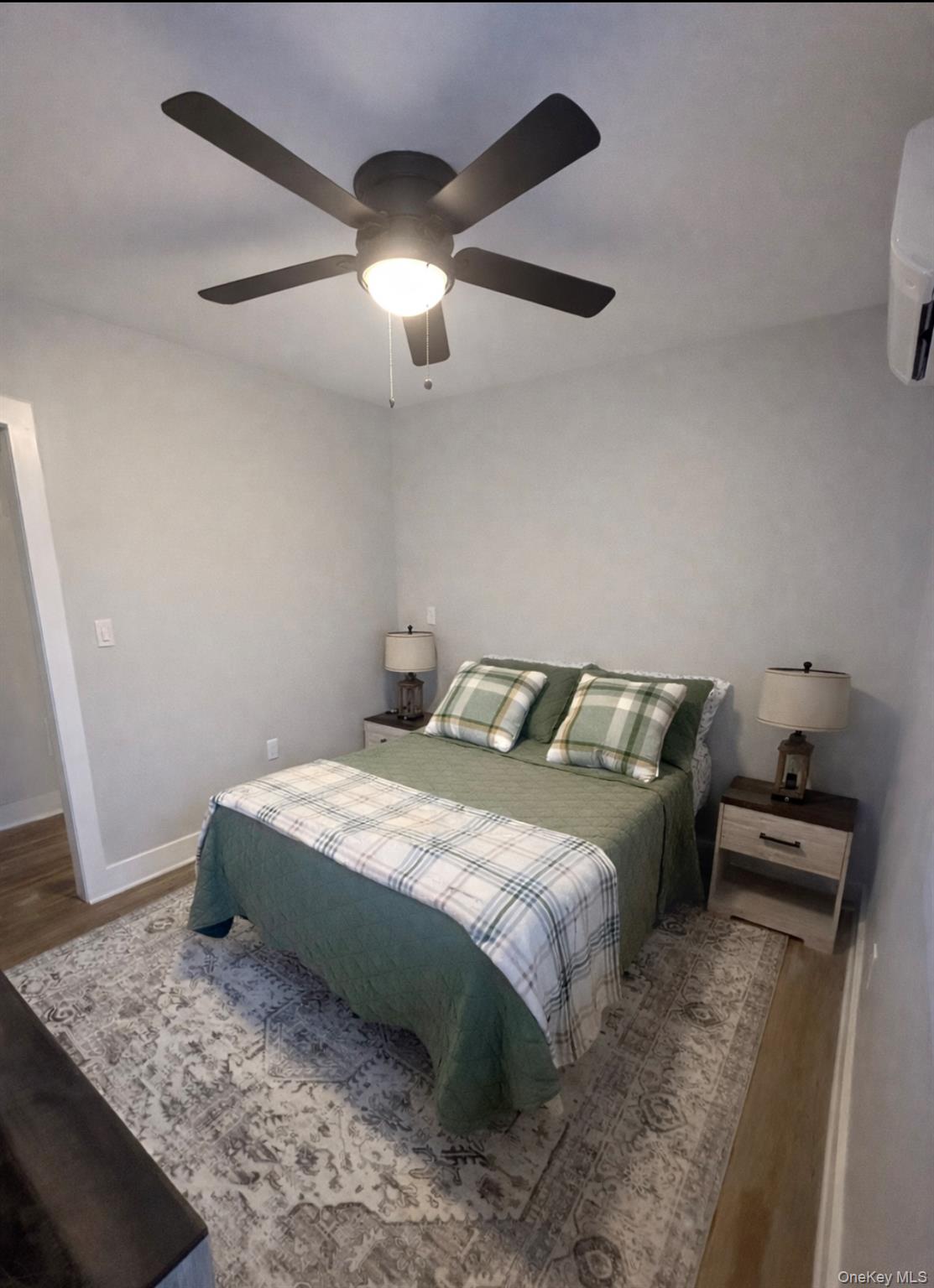 161 Hazel Road Livingston Manor, NY 12758 - Photo 21 of 24 Bedroom featuring wood finished floors and a ceiling fan