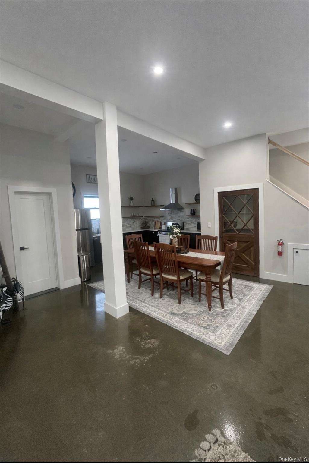 161 Hazel Road Livingston Manor, NY 12758 - Photo 3 of 24 Dining room with finished concrete floors and baseboards