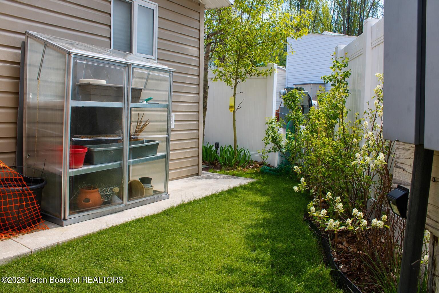 214 Buckboard Drive Star Valley Ranch, WY 83127 - Photo 20 of 23 Greenhouse