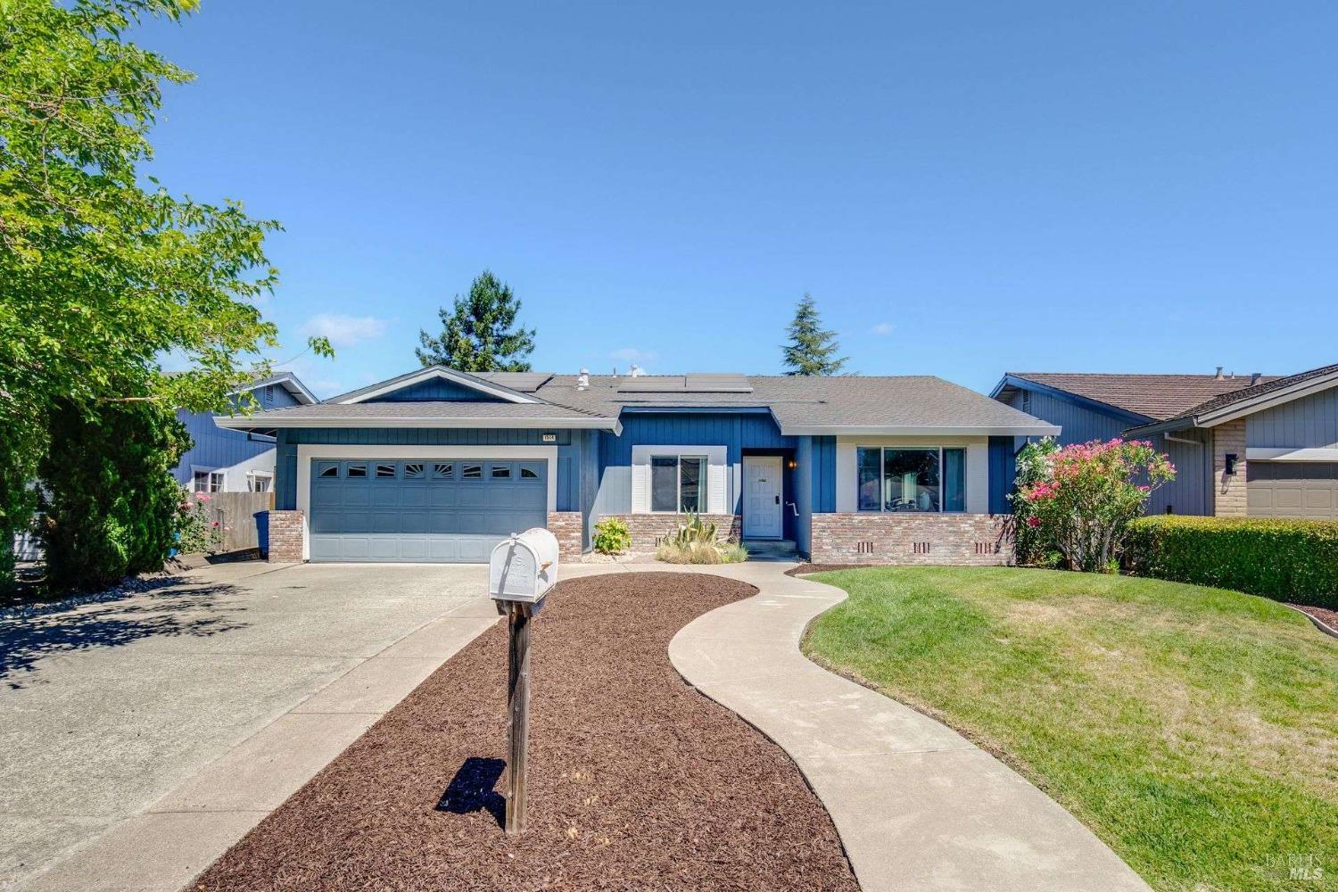1514 Golf Course Drive Rohnert Park, CA 94928 - Photo 1 of 1 a front view of a house with a yard