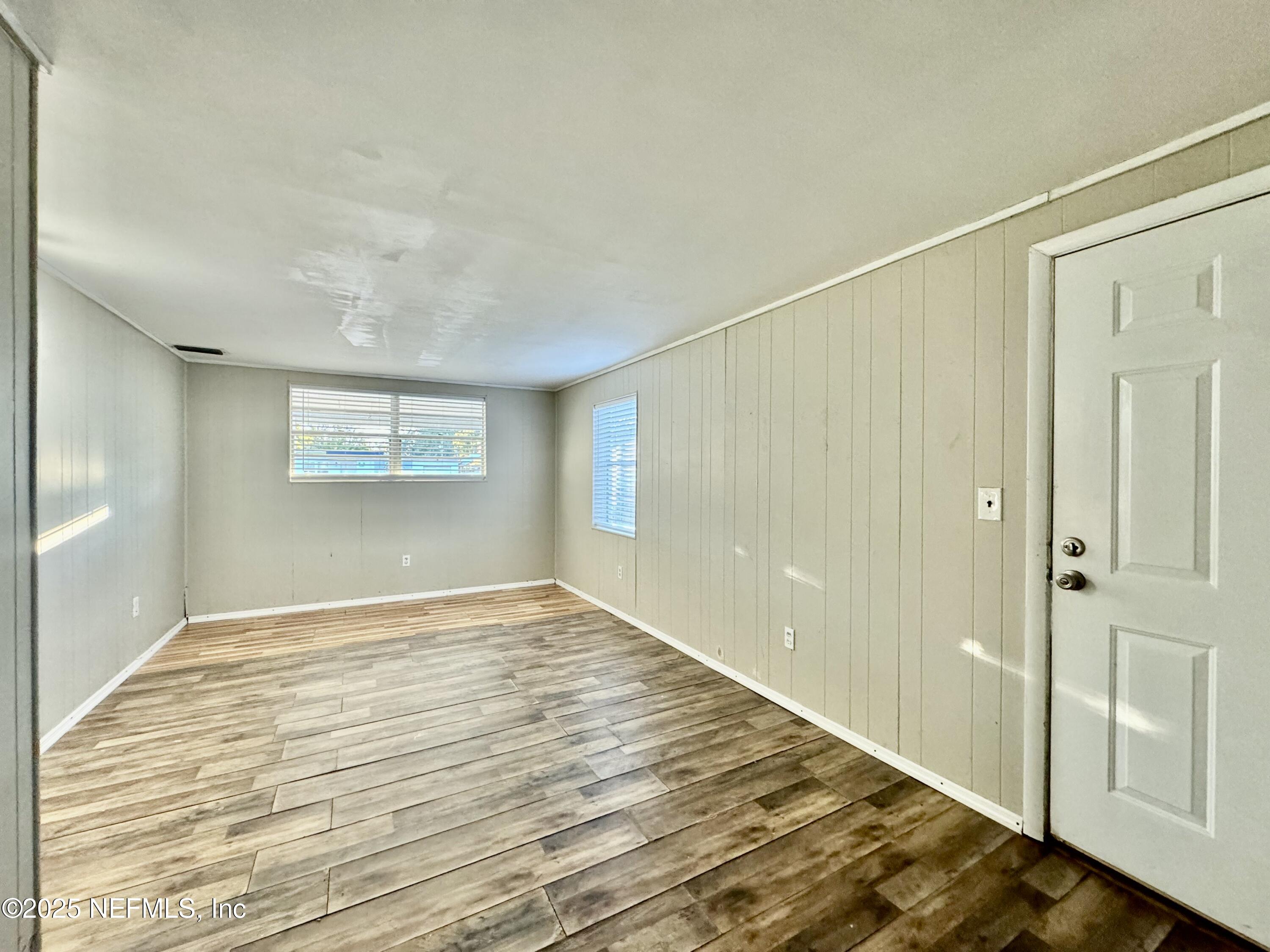 1157 Gunka Road Jacksonville, FL 32216 - Photo 11 of 24 a view of an empty room and window